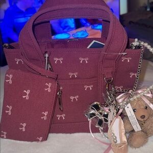 🎀Madden girl Burgundy minni tote  with Pink Bow 🎀